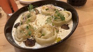 Wild mushroom tortellini – Homemade tortellini with basil tofu ricotta, tempeh and wild mushrooms, served with a creamy sauce, truffle oil, walnut rawmazan  at Palo Verde in Prague