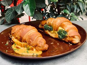 Salty croissants with cheese and tofu scramble  at Palo Verde in Prague