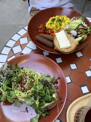 Top: scrambled tofu / bottom: hummus & avocado bread  at Palo Verde in Prague