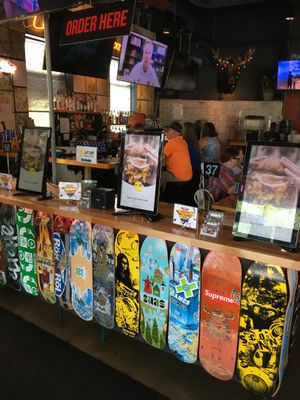 Kiosk ordering stations at Hot Chip Burger Bar in Rochester