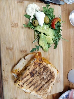 Parmigiana toasted sandwich, served with a small salad at Embrace Cafe in North London