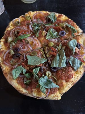 Create your own small pizza without cheese   at Minuteman Pizza in Uyuni