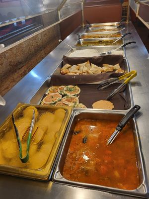 So many delicious dishes! at Zaika Indian Cuisine in Austin