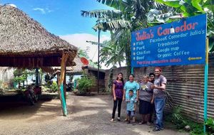Edmundo and his family outside of their restaurant  at Comedor Julias in Ometepe