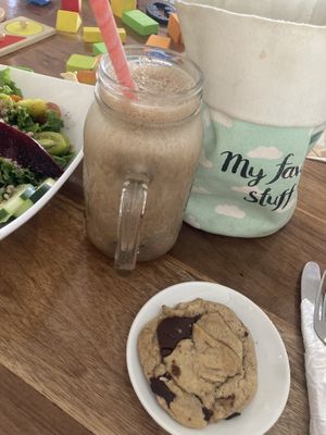 Coffee smoothie, toys, cookie hiding behind everything  at Karma in Jaco