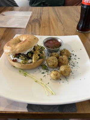 Tofu scramble bagel   at Karma in Jaco