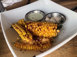 Corn ribs plus delicious sauces  at Karma in Jaco