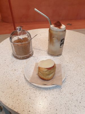 Iced Buddy and a cinnamon roll at Buddy Buddy in Brussels