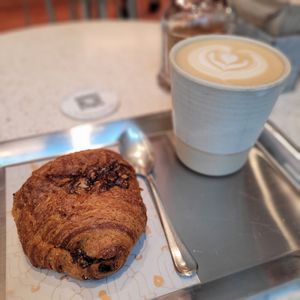 Pain au chocolat and oat latte at Buddy Buddy in Brussels