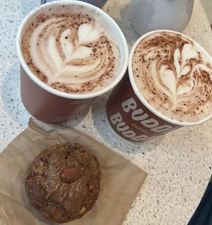 panque de zanahoria y coco con chocolates calientes  at Buddy Buddy in Brussels