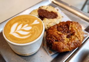 Flat White + Pain au chocolat + Swookie at Buddy Buddy in Brussels