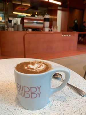 Dirty chai = chai almond butter milk with a shot of expresso at Buddy Buddy in Brussels