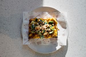 Satay You Stay - Toast with vegan chick'n, courgette, lime juice, chilli flakes & homemade peanut butter-based satay sauce at Buddy Buddy in Brussels