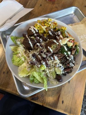 Create your own salad bowl with falafel, lentils, couscous, veggies, olives and grains. Comes with pita breadd  at Mezeh in Blacksburg