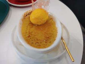 Creme brulee with a dollop of mandarin orange ice cream at AcheMi in Seoul