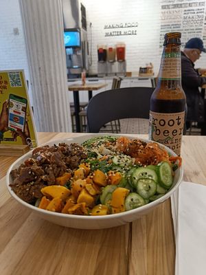A huge bowl and a root beer at Veggie Grill by Next Level - W 23rd in New York City