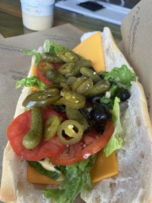 Vegan cheese with all the toppings!  The cornichons are delicious.   at La Sandwicherie in Miami Beach