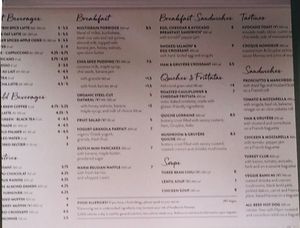 Wall menu (the vegan items are designated with a "V") at Le Pain Quotidien - Bryant Park Kiosk in New York City