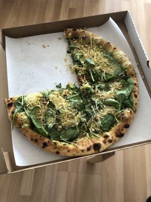 Vegan Verde: pesto, vegan cheese, oven baked tomatoes, cherry tomatoes, nuts, baby spinach and vegan grana padana cheese at Pixel in Solna