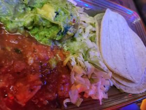 Sides for fajitas at Universal Studios - Antojitos Authentic Mexican Food in Orlando