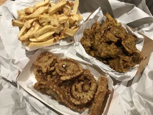 This was the vegan fish, onion rings and chips for one! Threw more than half of it away as it was meh and just very heavy food without much taste. Disappointing.   at Captain Cod in Boston