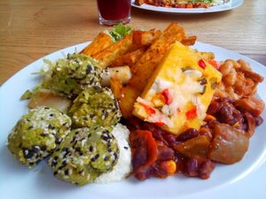 Green peas balls, corn based pizza, baked sweet potato at DaTerra - Parque das Nações in Lisbon