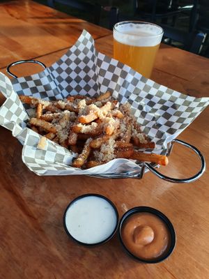 Vegan garlic parmesan fries with vegan sauces  at The Point in Bend