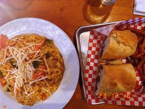 “World Famous Vegan Mac n Cheese” and the Vegan Philly Cheesesteak (which was just a $18 loaf of sourdough)   at The Point in Bend