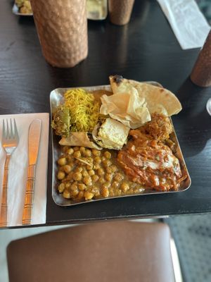 Chana masala, veg chilli Miri, lemon rice, butter naan, cheesy cornflake ball, cheesy tofu bite  at Bhaji Pala in Gatley