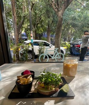 Avocado toast 2.0 with vegan latte paired with a wonderful view   at Mora Mora - Condesa in Mexico City