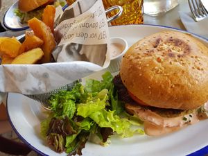 Vegan lentil burger with chips and cocktail sauce at Alter Schlachthof in Bressanone