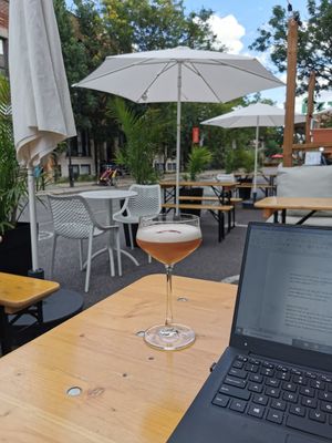 Cocktail on the patio at Archway Verdun in Montreal