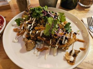 Scrambled tofu on toast with mixed veggies and sauces at Lion's Locker in Budapest