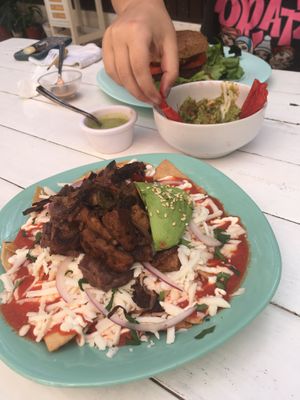 Chilaquiles, avocado and takis  at Changomango in Merida