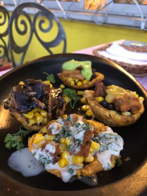 Patacones with different toppings at Casa Omedeto in Armenia