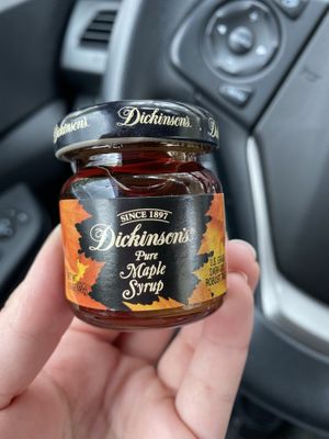 Mini syrup that comes with oatmeal on the side at Pressed Cafe in Newton