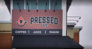 Picture of the outside of the building at Pressed Cafe in Newton
