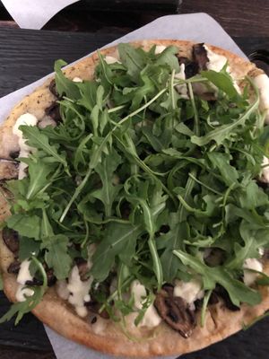 mushroom and arugula pizza at Virtuous Pie in Victoria