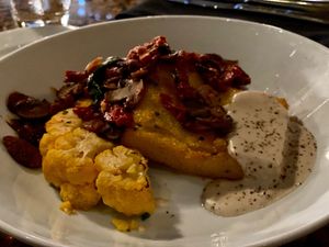 Polenta cake, mushroom, and herb cauliflower at Walt Disney World - Mama Melrose's Ristorante Italiano in Lake Buena Vista