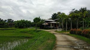 Road to restaurant and resort at The Govinda Farm in Chiang Mai