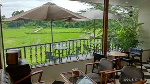 Restaurant sitting area at The Govinda Farm in Chiang Mai