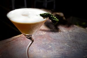 Sergeant Pepper featuring Vodka infused with Kampot Pepper, St Germain Elderflower Liquors, secret juices and fresh herbs ....
 at Sabay Beach in Kampot