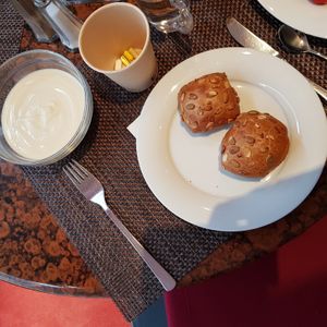 Left of the picture a bowl of soy yoghurt. at SORAT Hotel in Berlin