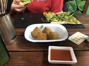 Coxinha and “Amazonas” pizza at Brasil Vegano Cafe in Guildford