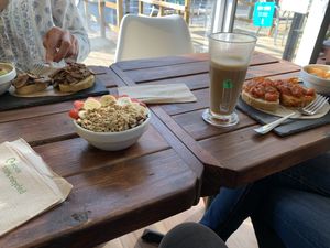 Açai bowl, roasted tomatoes on toast, mushrooms on toast,  at Brasil Vegano Cafe in Guildford