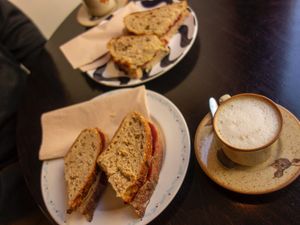 Tosta mista + caffè macchiato at Odete Bakery in Porto