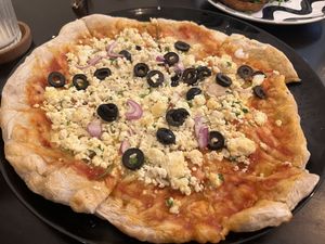 Tofu Ricotta Pizza  at Odete Bakery in Porto