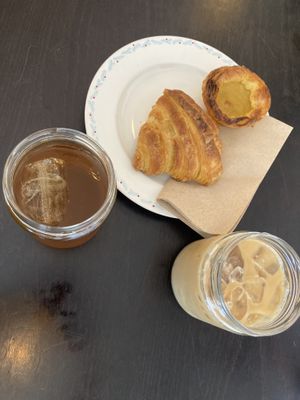 Croissant, pastel de nata, iced coffee and ice tea   at Odete Bakery in Porto