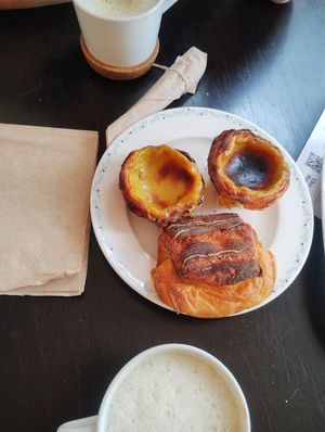 Pastel de natas, pain au chocolait and cappuccinos at Odete Bakery in Porto