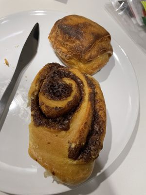 Cinnamon roll and pain au chocolat  at Odete Bakery in Porto